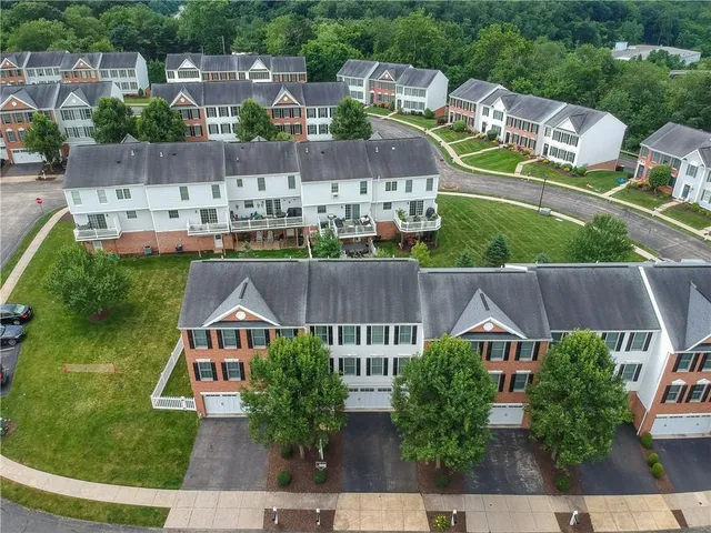 an aerial view of multiple houses
