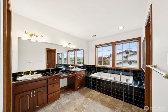 a large kitchen with a large window