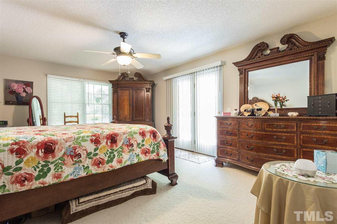 51 Hunters Lane Timberlake, NC 27583 - Photo 14 of 30 a bedroom with a bed and window