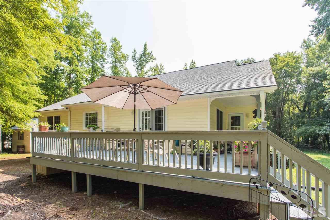 51 Hunters Lane Timberlake, NC 27583 - Photo 23 of 30 a view of a house with a roof deck