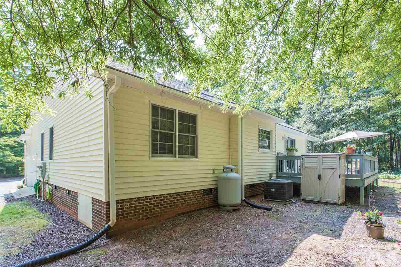 51 Hunters Lane Timberlake, NC 27583 - Photo 26 of 30 a view of a back yard of the house
