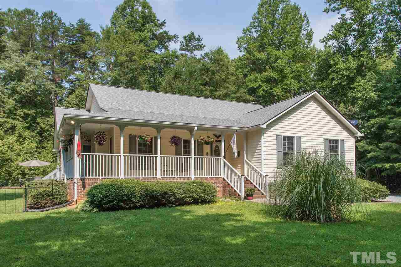 51 Hunters Lane Timberlake, NC 27583 - Photo 29 of 30 a front view of a house with a yard