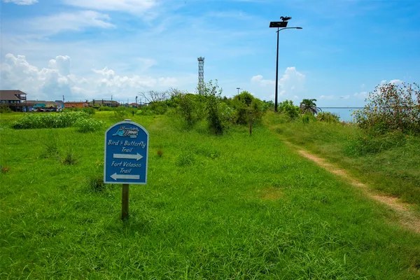 a view of a golf course with a garden