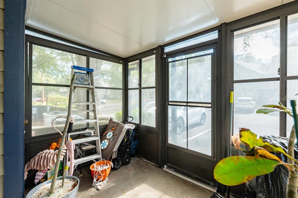 954 Forest Ridge Court, Unit 106 Lake Mary, FL 32746 - Photo 15 of 20 a view of a workspace with furniture and a window
