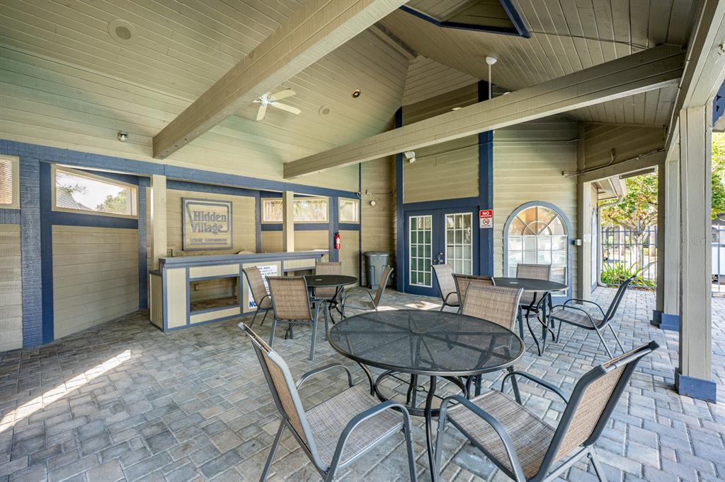 954 Forest Ridge Court, Unit 106 Lake Mary, FL 32746 - Photo 19 of 20 a view of a dining room with furniture window and outside view