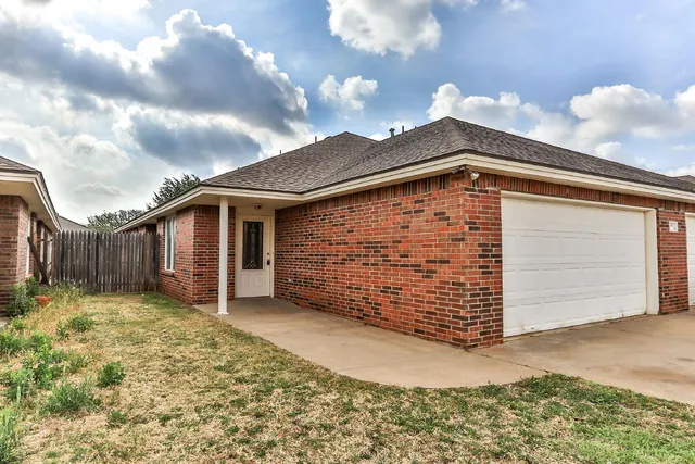 a view of a house with a garage