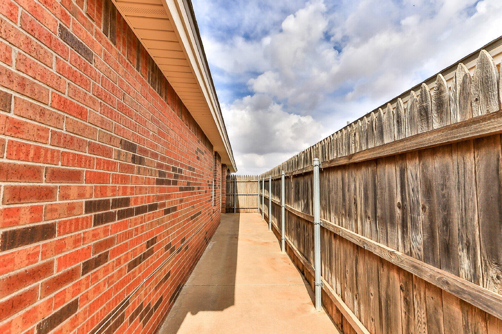 606 North Englewood Avenue, Unit A Lubbock, TX 79416 - Photo 17 of 19 a view of balcony with wooden floor