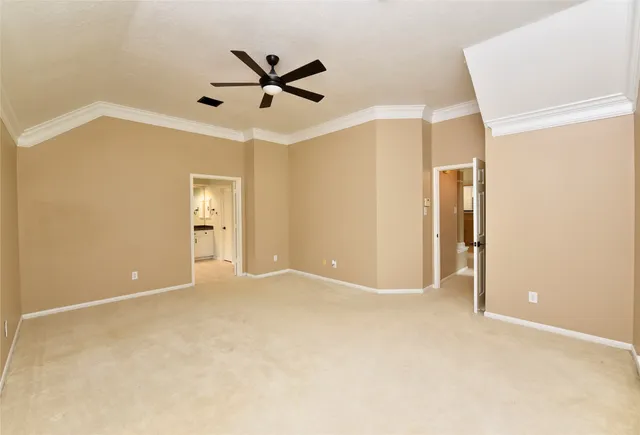 a view of a livingroom with a ceiling fan