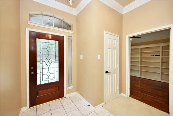 a view of walk in closet with cabinet