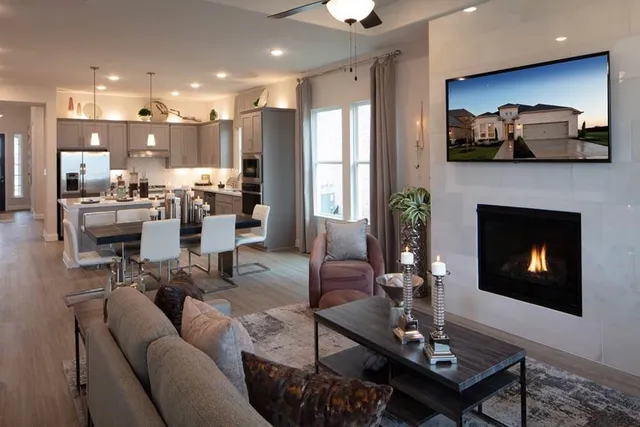 a kitchen with kitchen island a sink stove and refrigerator