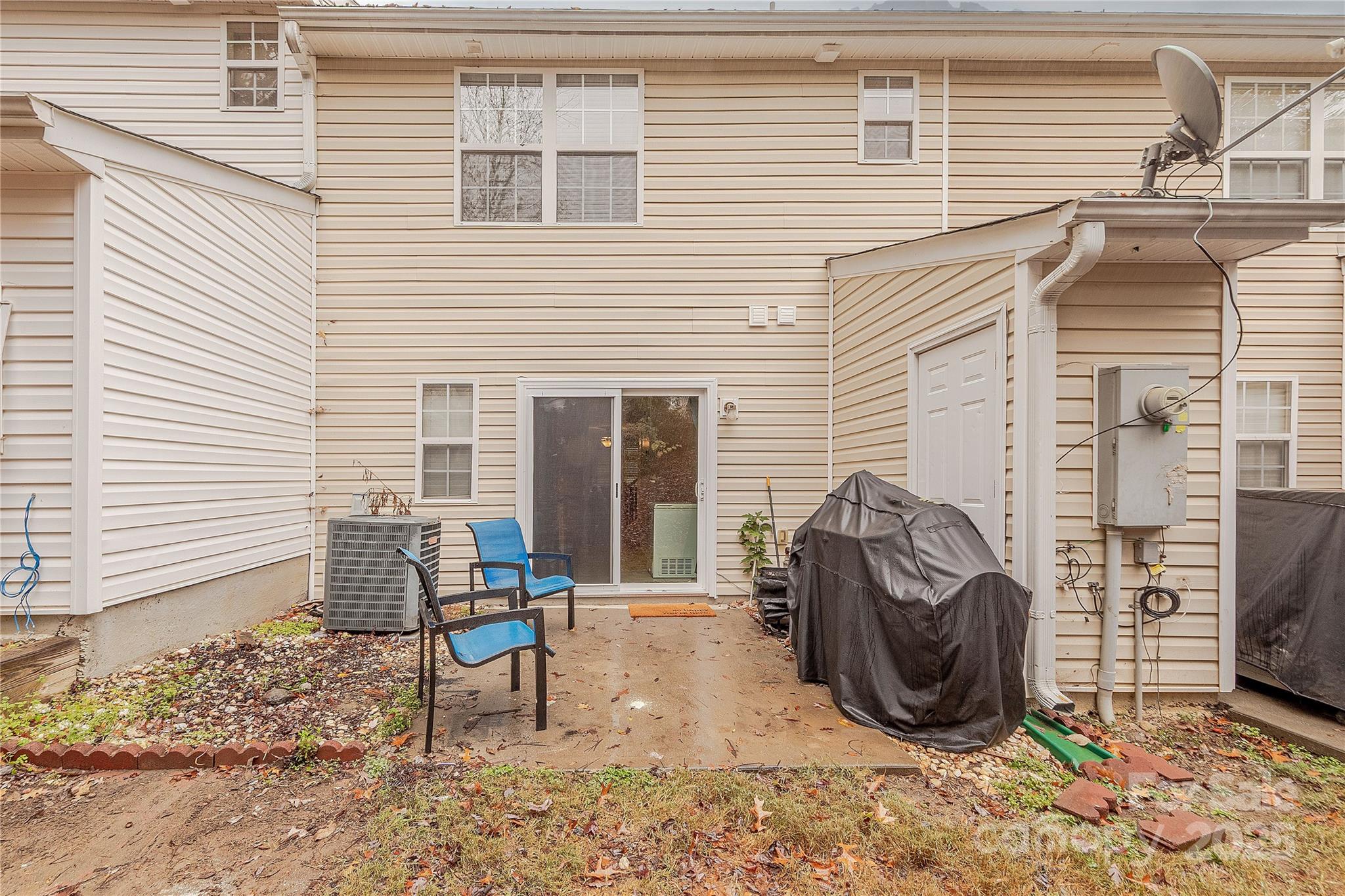 1581 Maypine Commons Way Rock Hill, SC 29732 - Photo 15 of 16 a view of a two chairs in the back yard