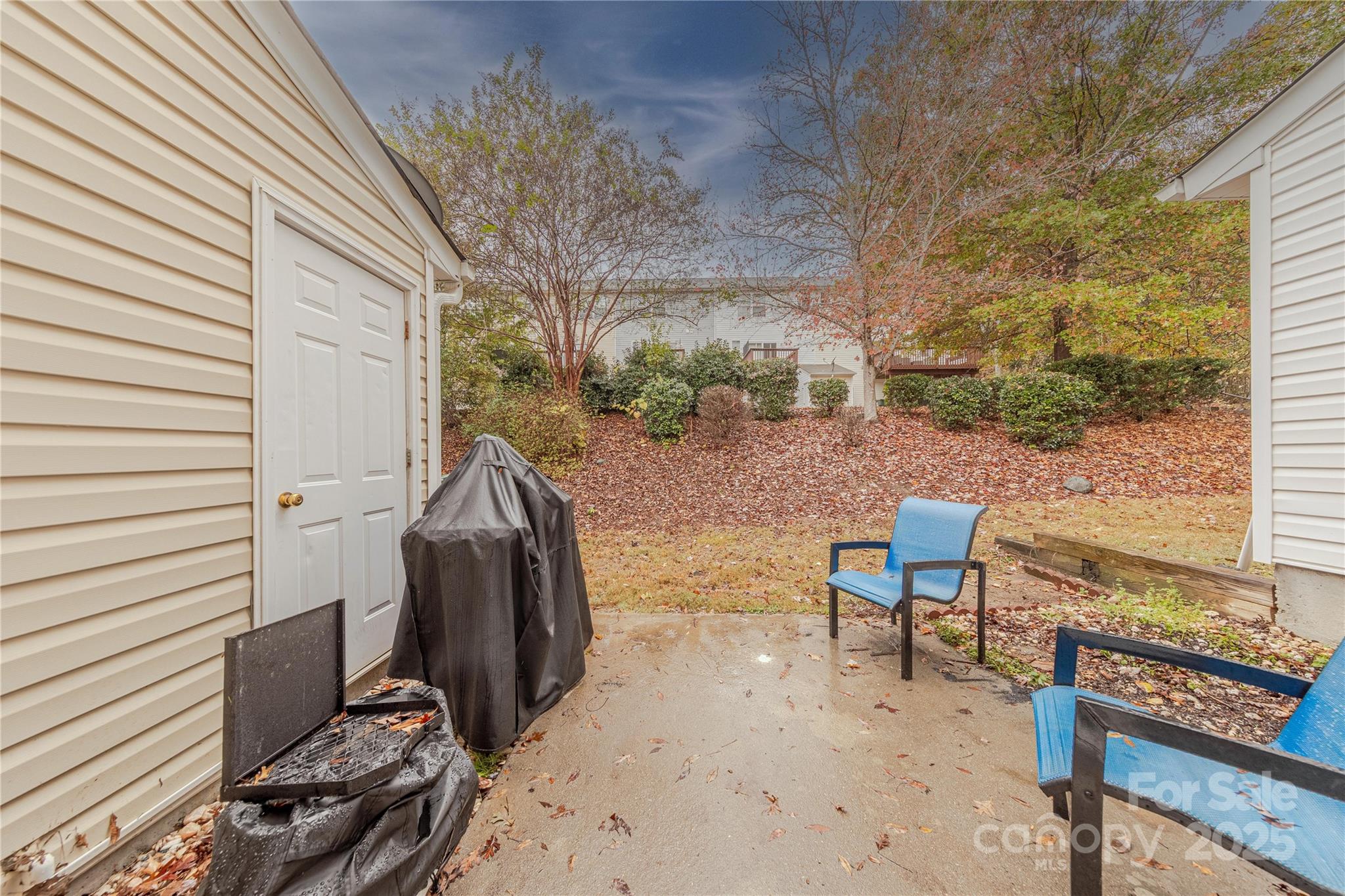 1581 Maypine Commons Way Rock Hill, SC 29732 - Photo 16 of 16 a view of a backyard with furniture and a grill