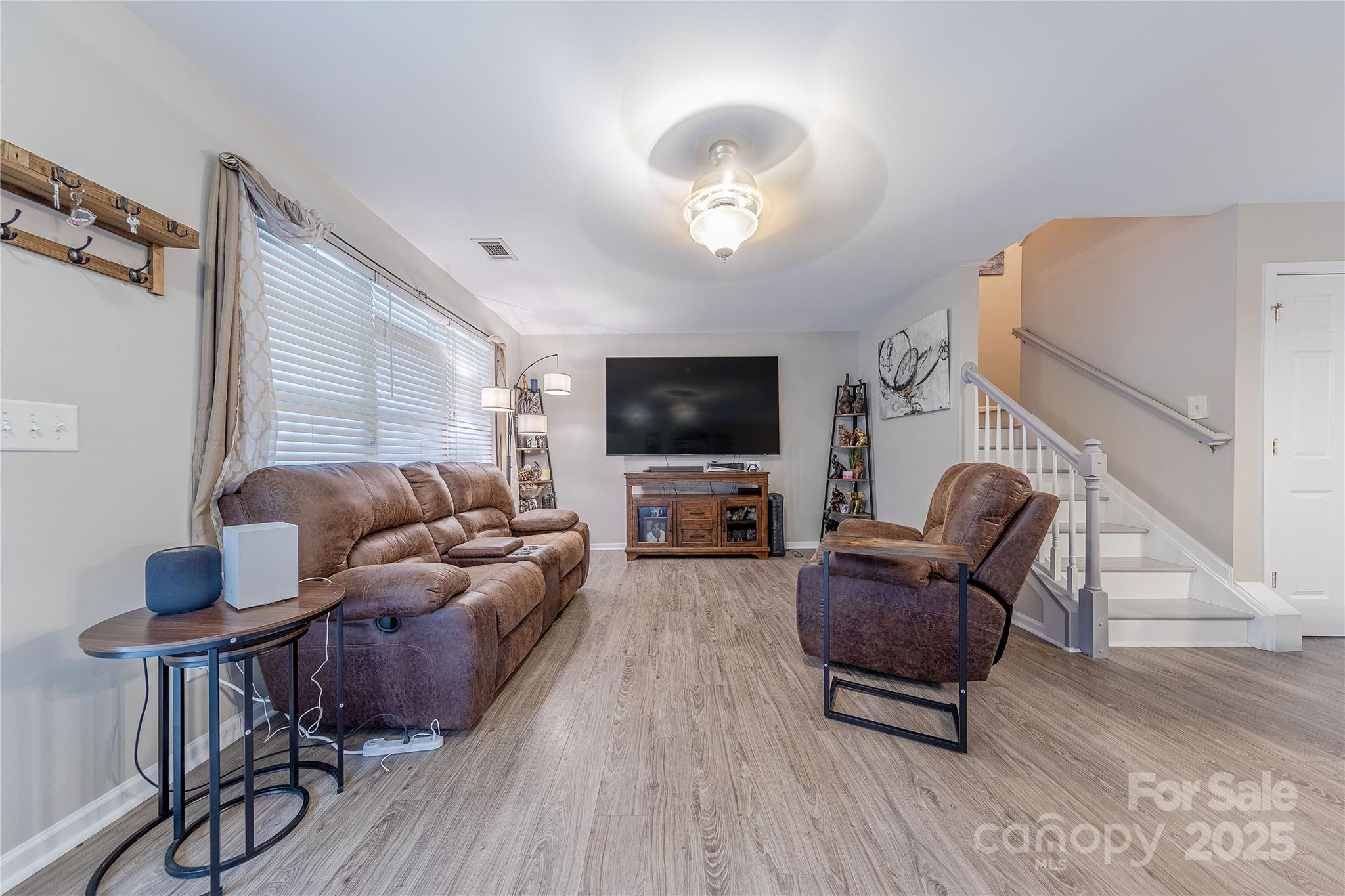 1581 Maypine Commons Way Rock Hill, SC 29732 - Photo 2 of 16 a living room with furniture and a flat screen tv