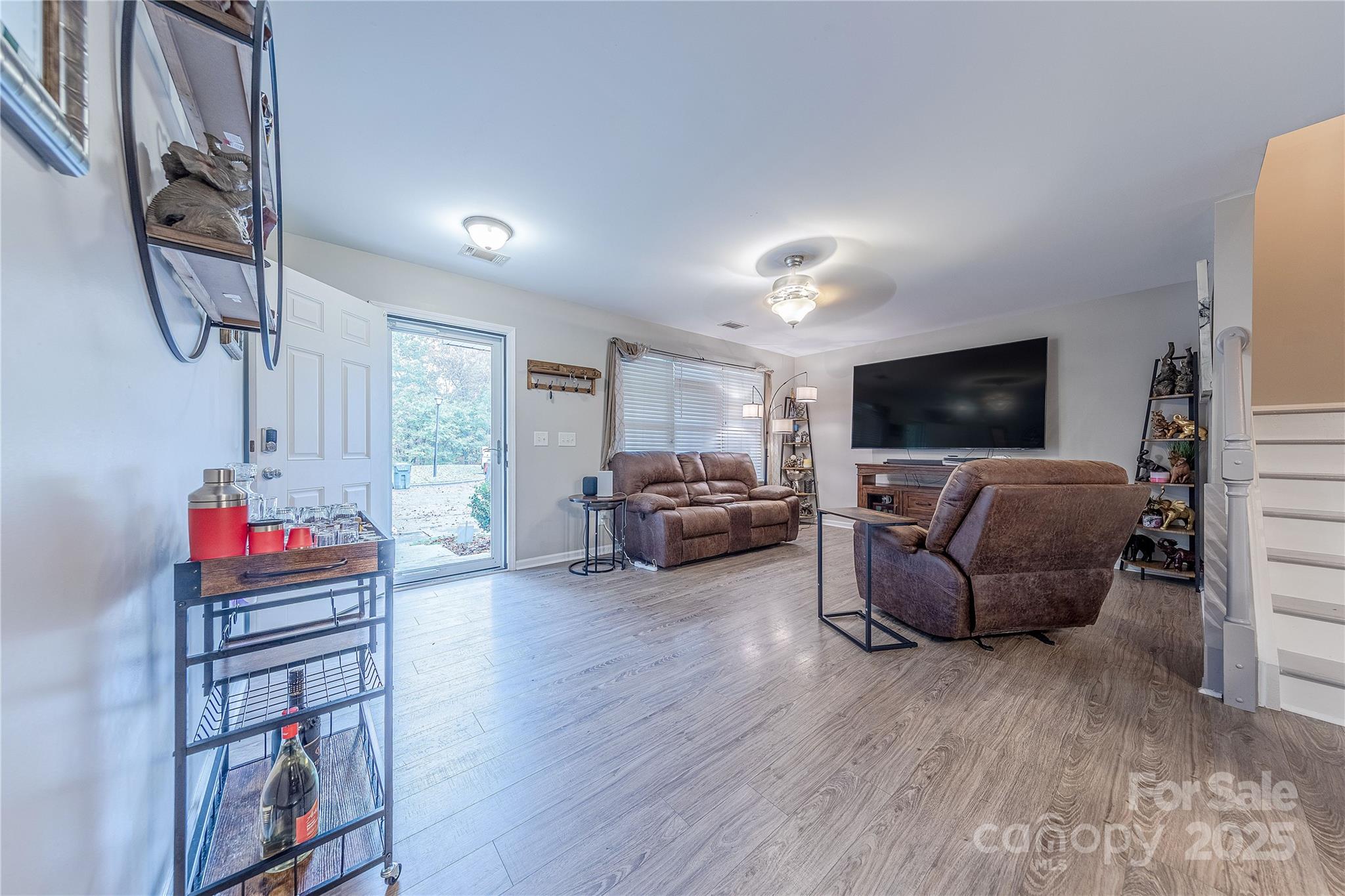 1581 Maypine Commons Way Rock Hill, SC 29732 - Photo 3 of 16 a living room with furniture and a flat screen tv