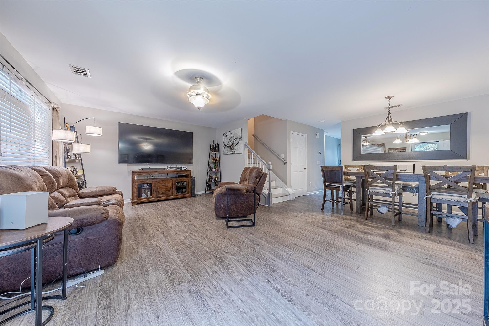 1581 Maypine Commons Way Rock Hill, SC 29732 - Photo 5 of 16 a living room with furniture and a flat screen tv
