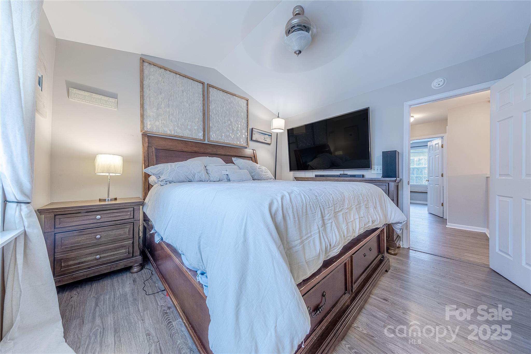 1581 Maypine Commons Way Rock Hill, SC 29732 - Photo 10 of 16 a bedroom with a bed and a flat screen tv