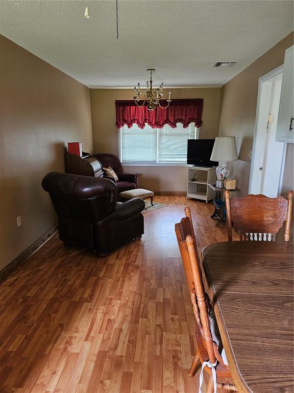 3602 Robert Murphy Road Graceville, FL 32440 - Photo 12 of 39 a living room with furniture and a flat screen tv
