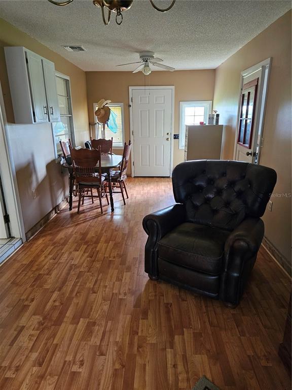 3602 Robert Murphy Road Graceville, FL 32440 - Photo 13 of 39 a living room with furniture and a wooden floor