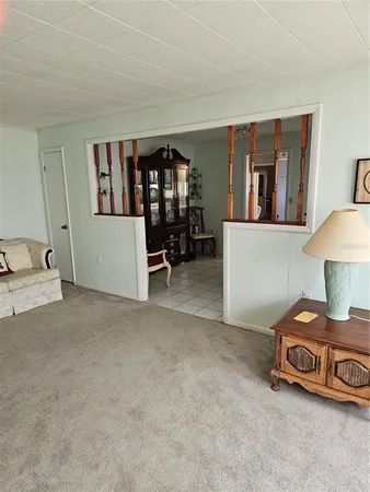 a view of livingroom with furniture and closet