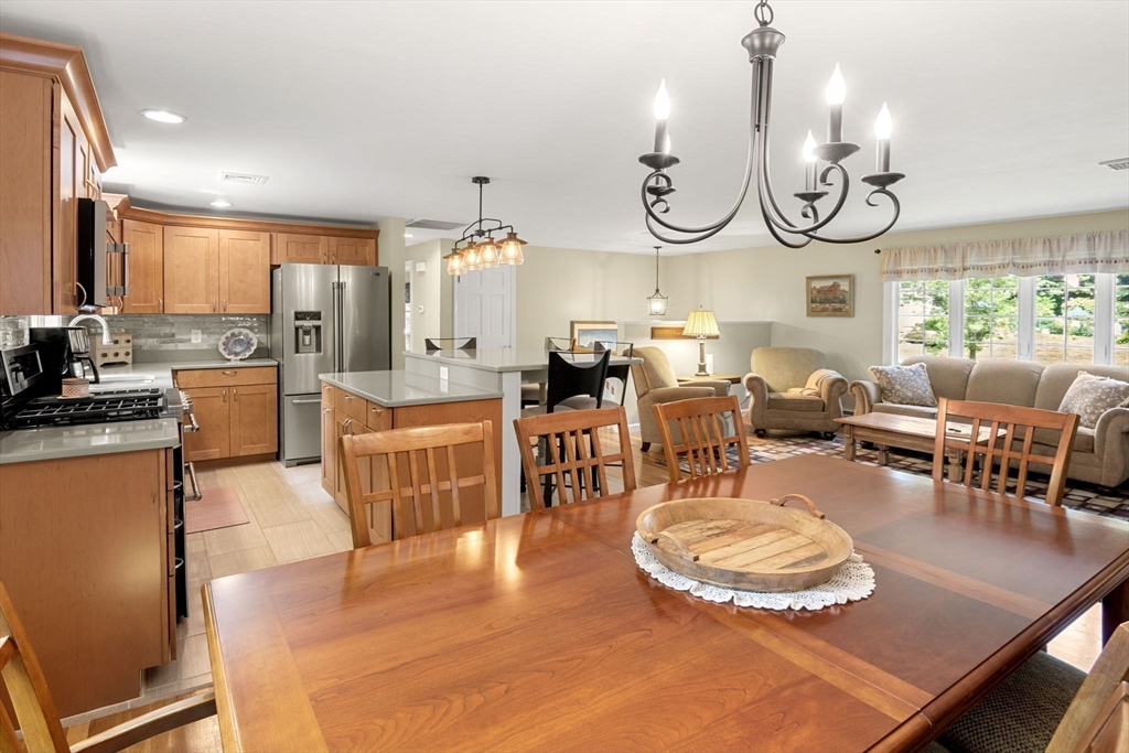 13 Spring Street Danvers, MA 01923 - Photo 11 of 39 a living room with lots of furniture and a large window
