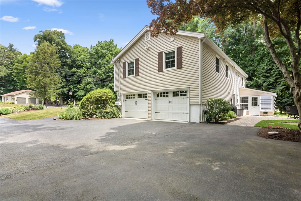 13 Spring Street Danvers, MA 01923 - Photo 2 of 39 a view of a house with a yard and sitting area