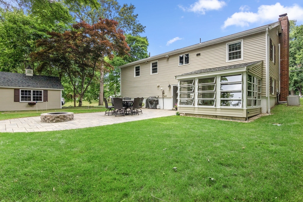 13 Spring Street Danvers, MA 01923 - Photo 3 of 39 a view of a house with backyard and sitting area