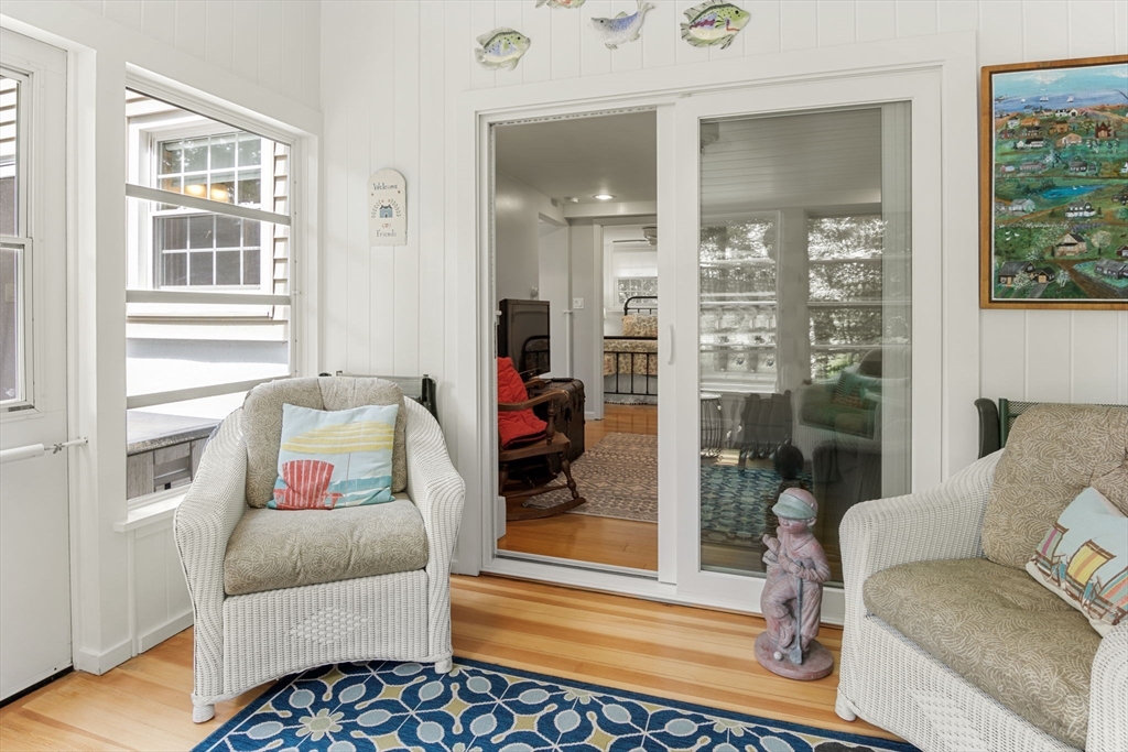 13 Spring Street Danvers, MA 01923 - Photo 35 of 39 a living room with furniture and a floor to ceiling window