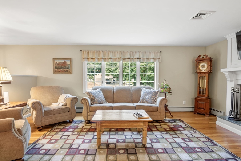 13 Spring Street Danvers, MA 01923 - Photo 9 of 39 a living room with furniture and a rug
