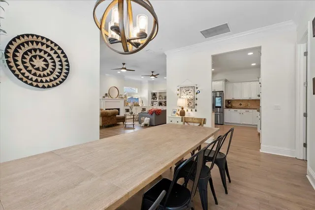 a living room with furniture and a piano