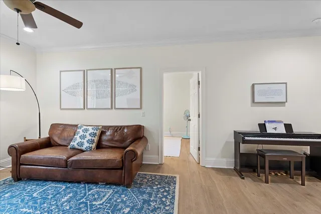 a room with a dresser and mirror