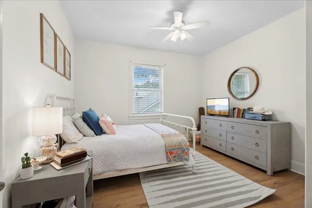 a view of a patio with couple of chairs