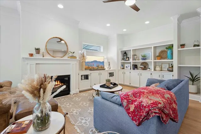 a living room with furniture and a table
