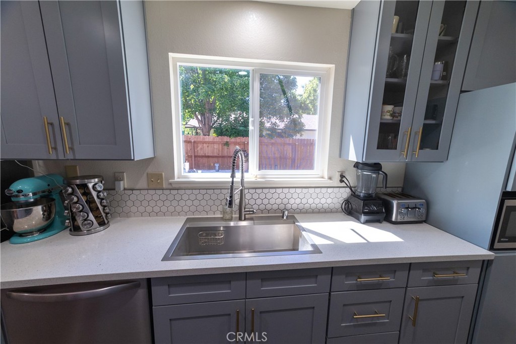 1 San Ramon Drive Chico, CA 95973 - Photo 9 of 42 a kitchen with a sink and cabinets
