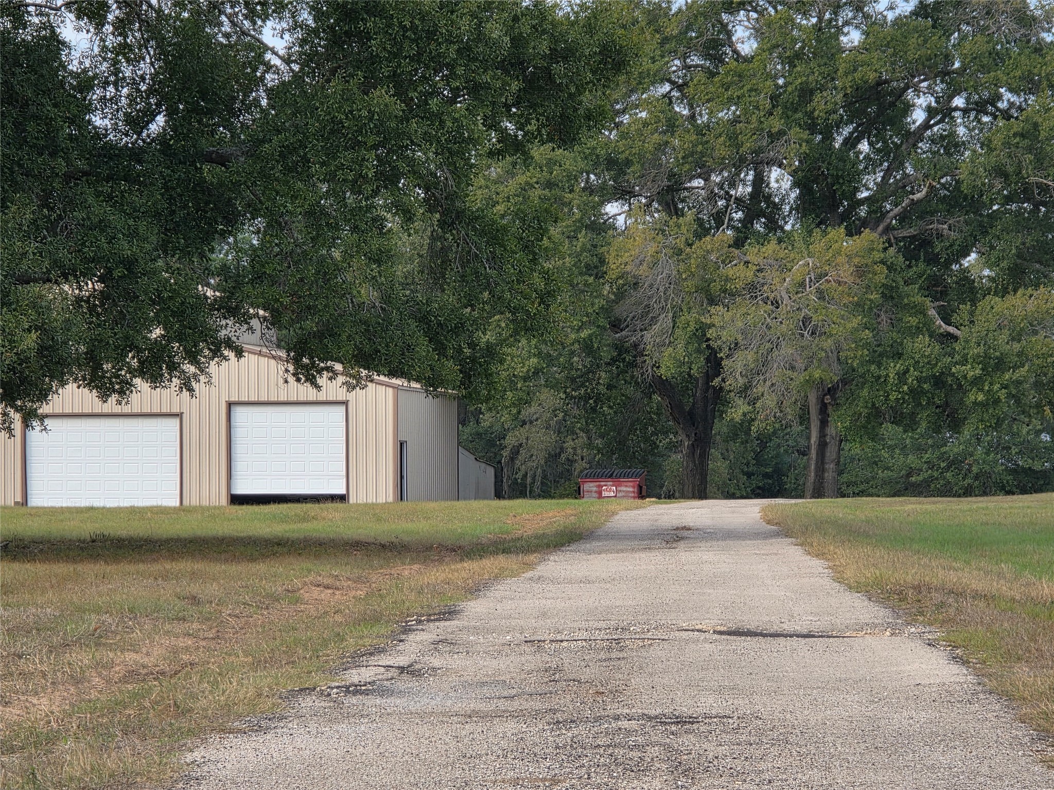 27303 Decker Prairie-Rosehill Road Magnolia, TX 77355 - Photo 5 of 9 a house with trees in front of it