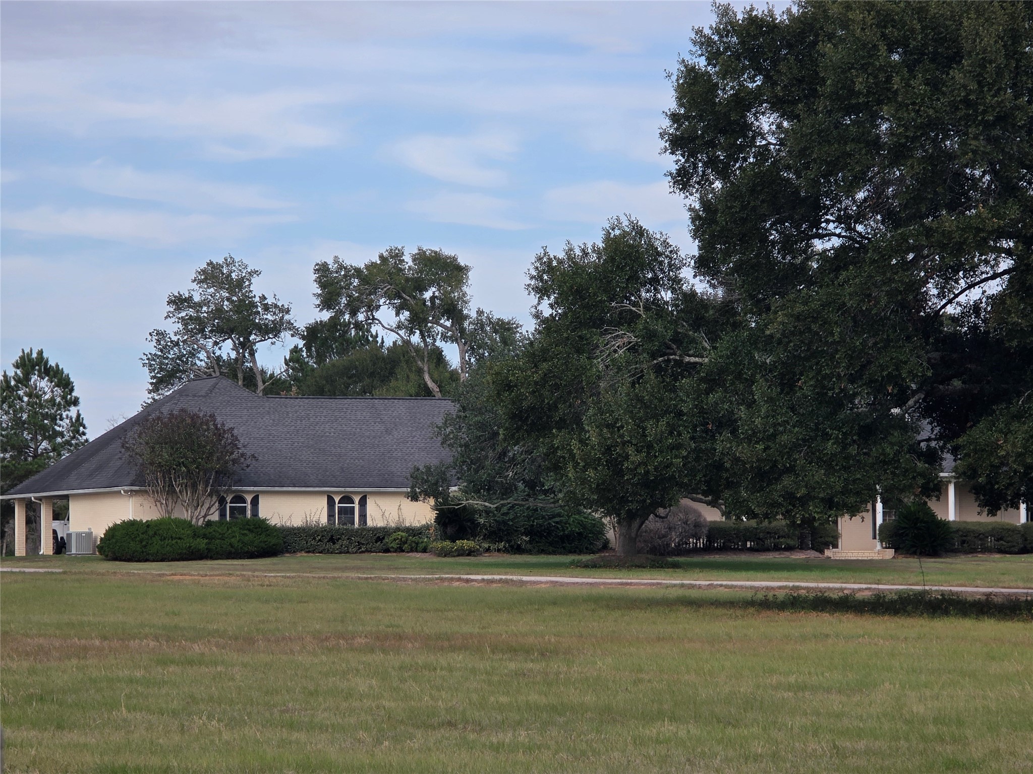 27303 Decker Prairie-Rosehill Road Magnolia, TX 77355 - Photo 8 of 9 a front view of a house with a garden