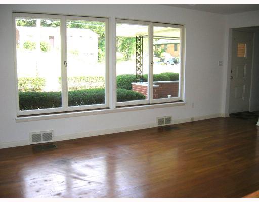 407 Soose Road Pittsburgh, PA 15209 - Photo 2 of 13 Living Room. Large bright living room featurs hardwood floors and lots of windows