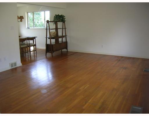 407 Soose Road Pittsburgh, PA 15209 - Photo 3 of 13 Living Room. The large living room is open to the dining room for easy entertaining