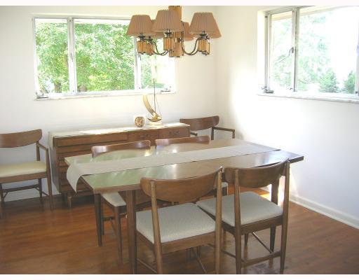 407 Soose Road Pittsburgh, PA 15209 - Photo 4 of 13 Dining Room. The bright dining room features hardwood floors, lots of windows and light fixture is included
