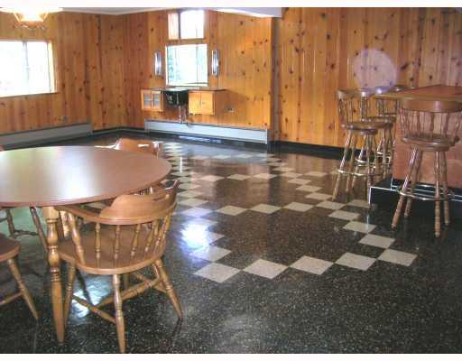 407 Soose Road Pittsburgh, PA 15209 - Photo 10 of 13 Other. The wonderful walk-out lower level Familyroom features solid knotty pine, built in bar with bar stools. A great area for all of your family gatherings. The door leads to the concrete patio.