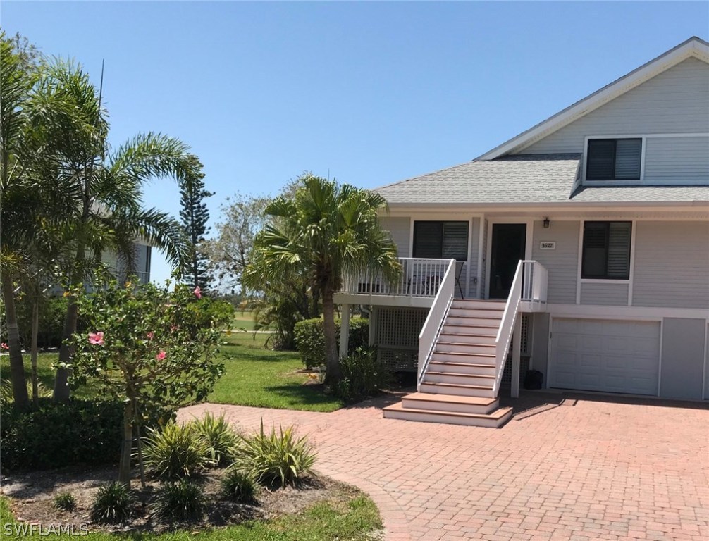 1627 Sand Castle Road Sanibel, FL 33957 - Photo 3 of 3 a view of a house with a patio