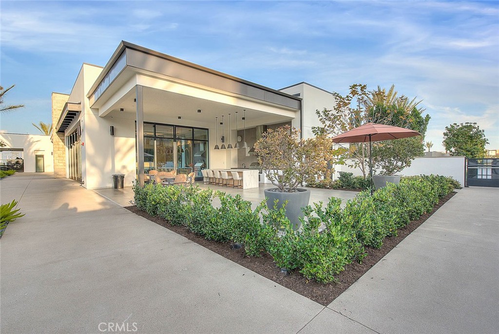 28 Remy Lane Montebello, CA 90640 - Photo 39 of 68 a front view of a house with a yard and outdoor seating