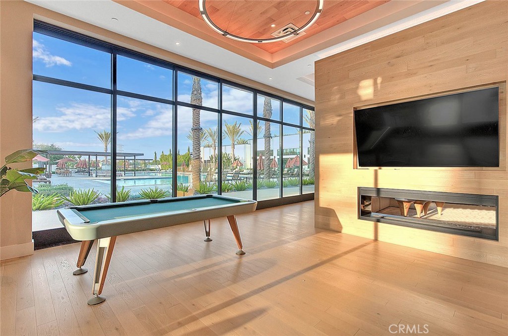 28 Remy Lane Montebello, CA 90640 - Photo 61 of 68 a living room with a flat screen tv and floor to ceiling window