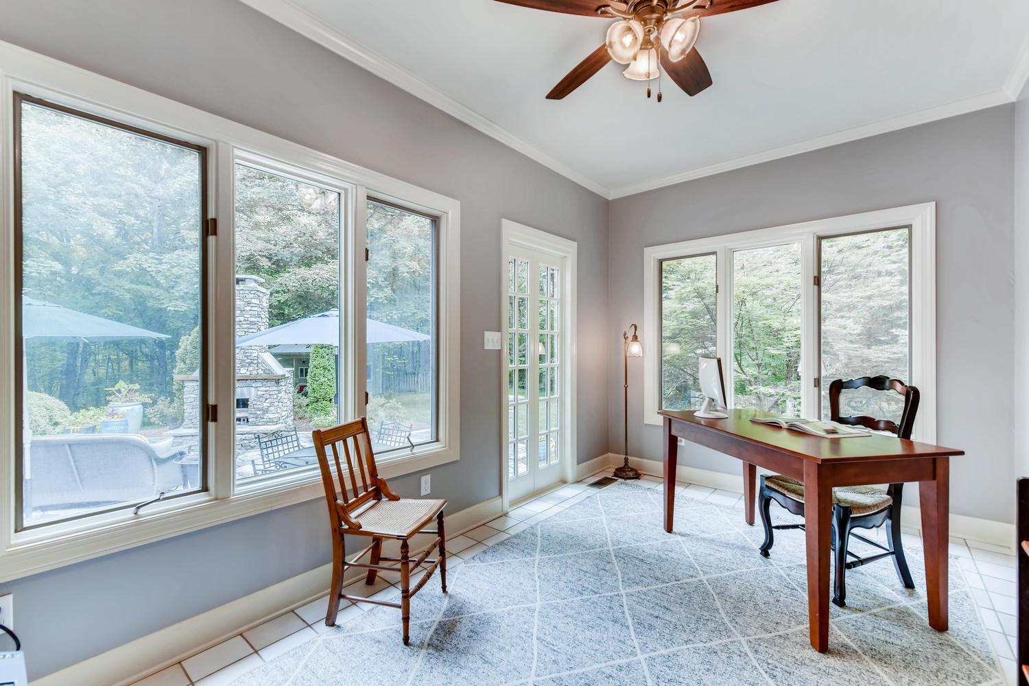 4218 B Crowder Road Franklin, TN 37064 - Photo 14 of 29 a workspace with wooden floor and a large window