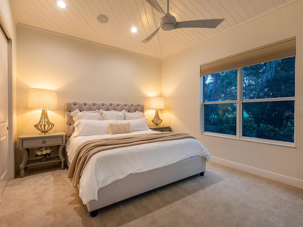 7431 Greystone Street Lakewood Ranch, FL 34202 - Photo 50 of 85 a bedroom with a bed and a window