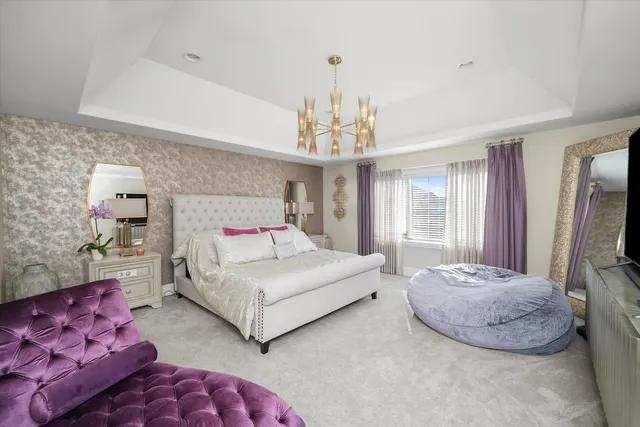 a bedroom with bed and a window