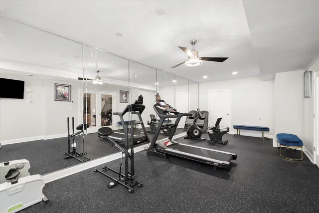 a large kitchen with stainless steel appliances granite countertop a stove oven and a sink