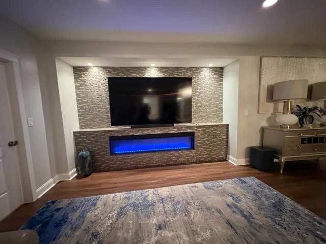 a bathroom with a double vanity sink toilet and shower