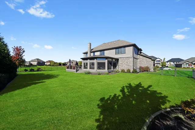 a view of a house with a big yard