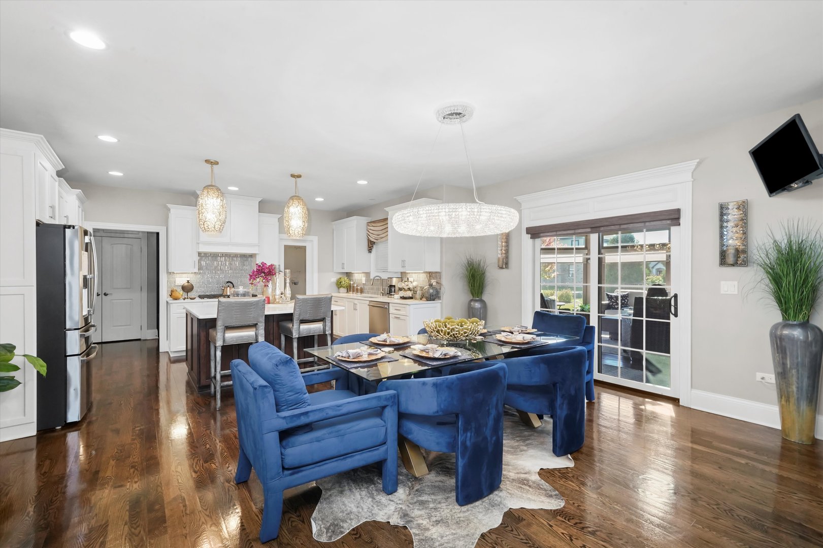 8613 High Stone Way Frankfort, IL 60423 - Photo 9 of 53 a view of a dining room with furniture window and wooden floor
