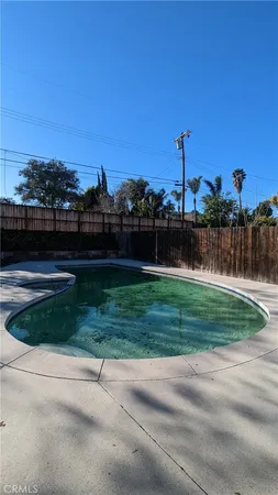 a view of a kitchen with a sink and cabinets